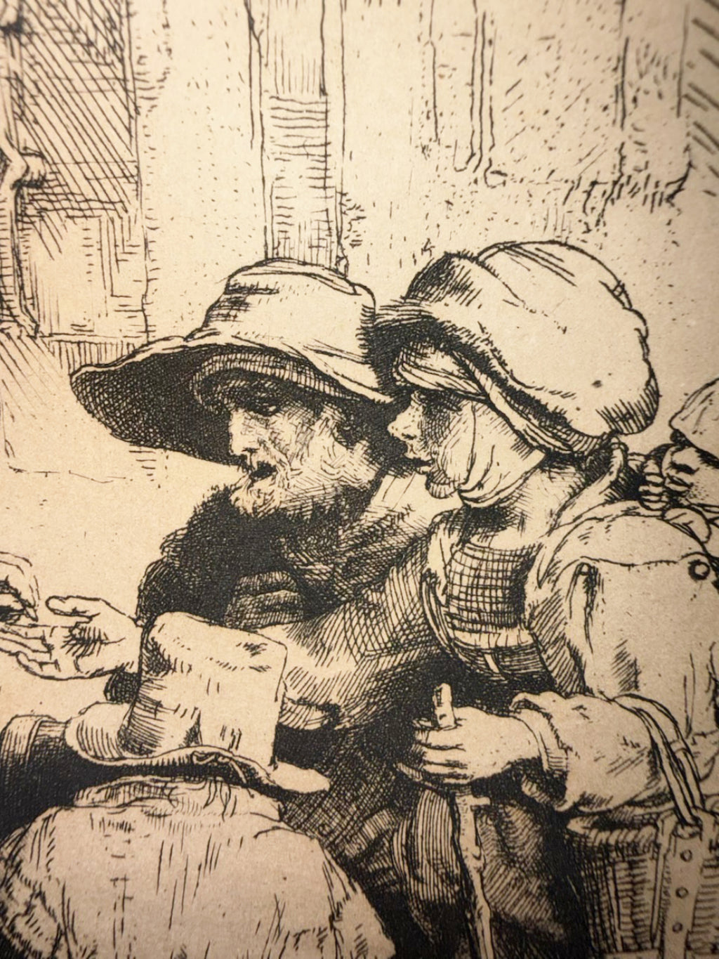 REMBRANDT VAN RIJN (1648) ETCHING TITLED BEGGARS RECEIVING ALMS AT DOOR OF A HOUSE, 15IN x 17IN (38cm x 43cm)